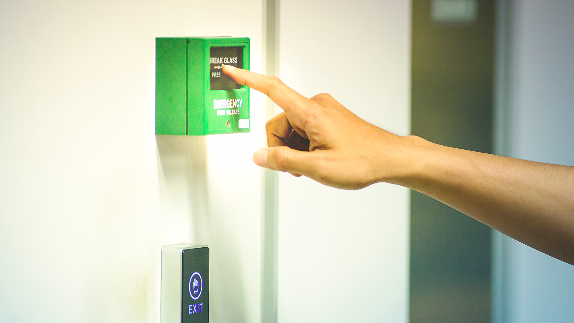 Man using emergency door release